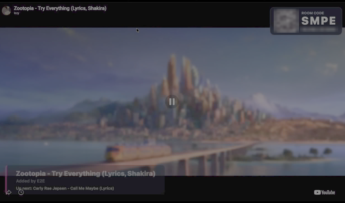 The TV player showing a video, the room code and what's up next
